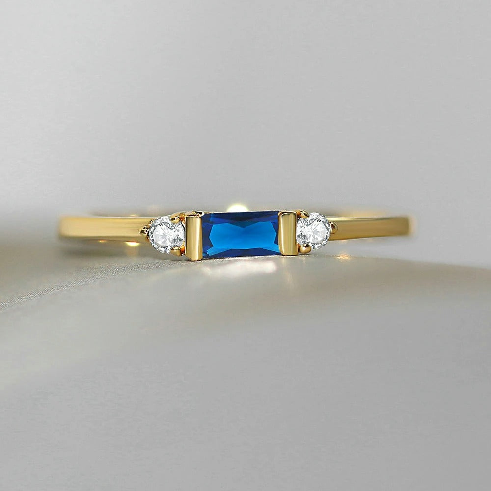 Gold Stunning Blue Center & Shimmering Ring