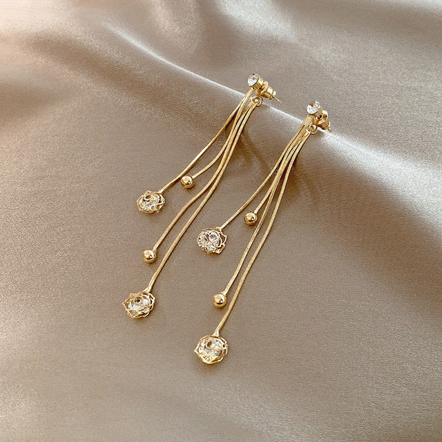 Dangling Earrings with Crystal Balls in Gold