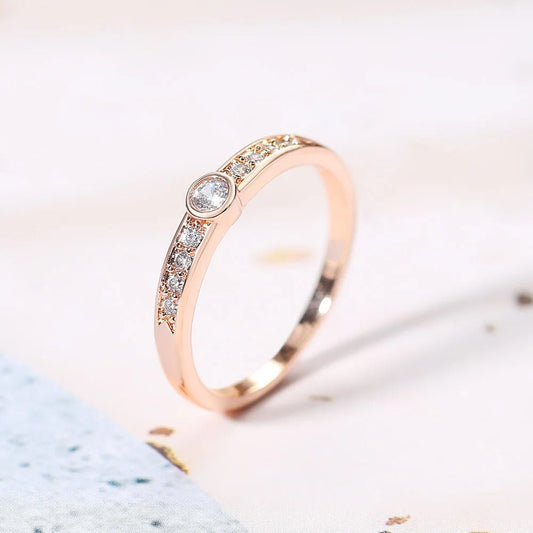 Rose Gold Center Round Stone & Paved Sparkling Ring