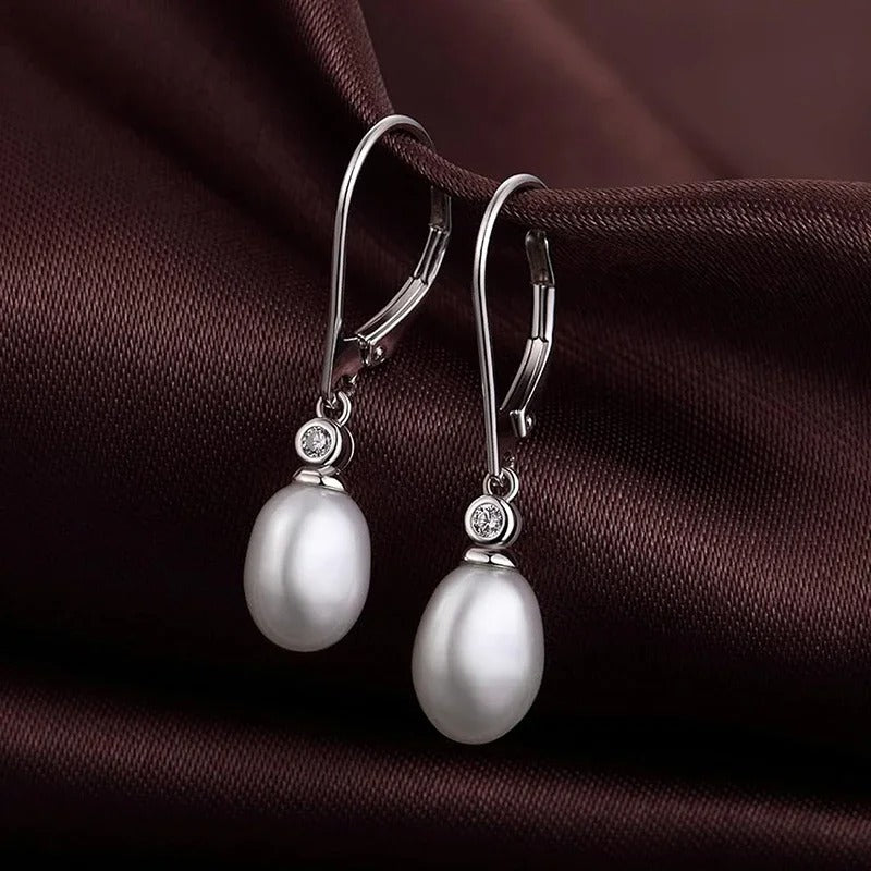 Oval Pearl Dangle Silver Earrings