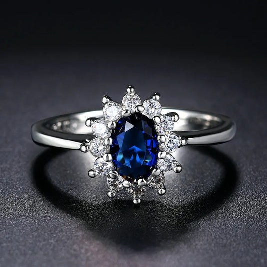 Silver Oval Blue Center Gemstone Halo Ring