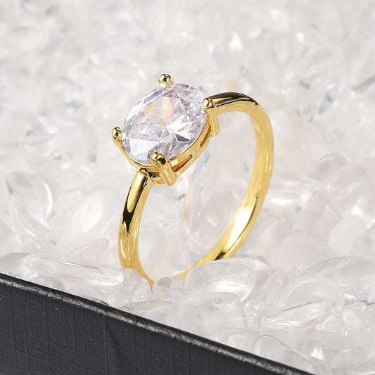 Gold Sparkling Oval Clear Stone & Simple Design Ring