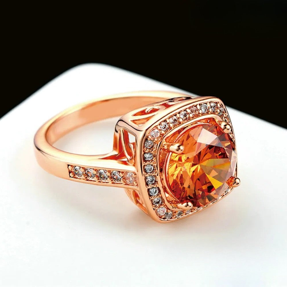 Rose Gold Crystal Center Stone & Sparkling Halo Ring